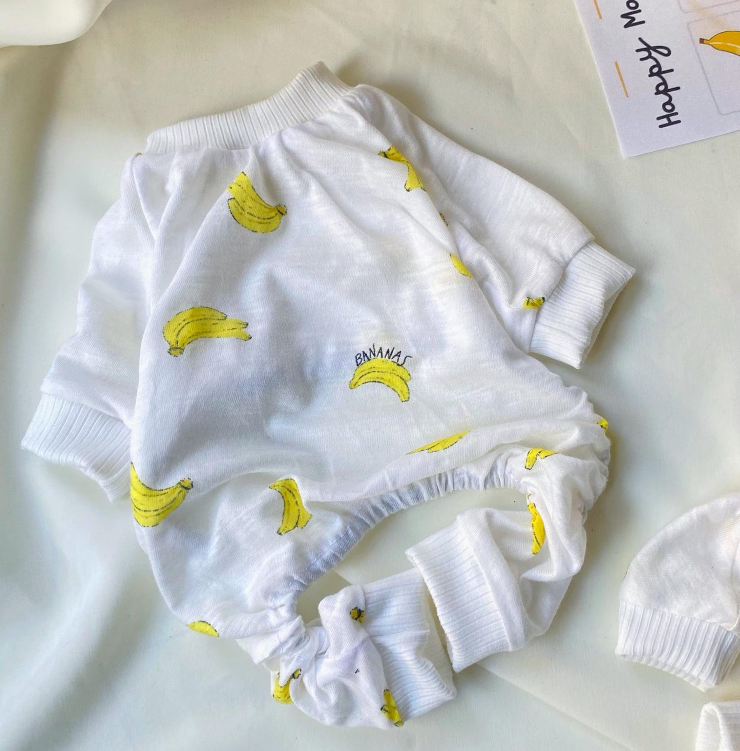 Dog pajamas White with yellow banana prints on a light background