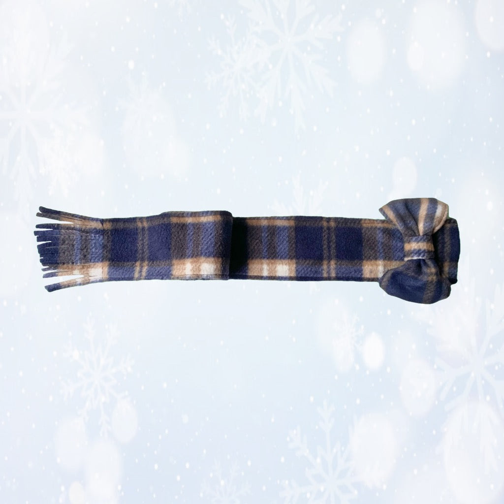 Plaid scarf on a light blue background